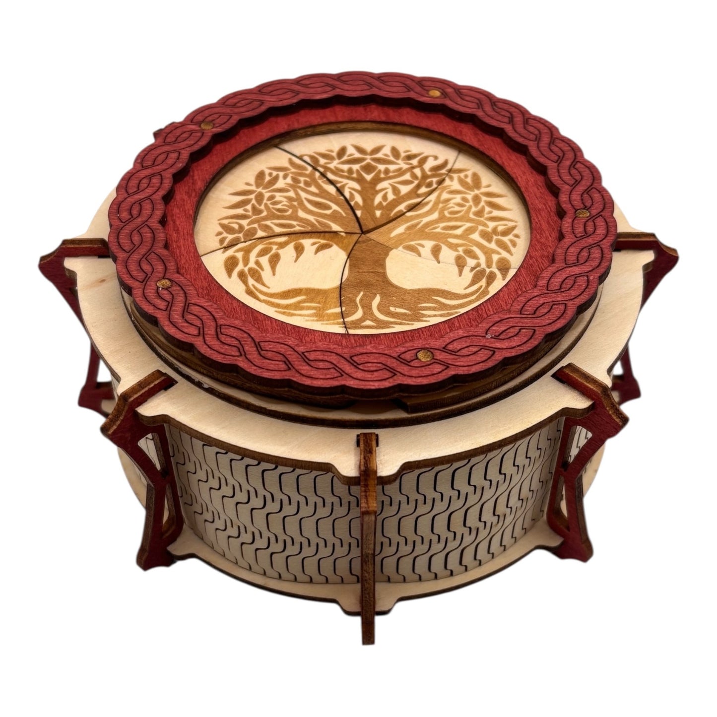 Boîte  ronde à mécanisme en bois, avec système d'ouverture ingénieux pour les esprits curieux. boite à bijoux, boite secrète.
De fabrication française et artisanale 