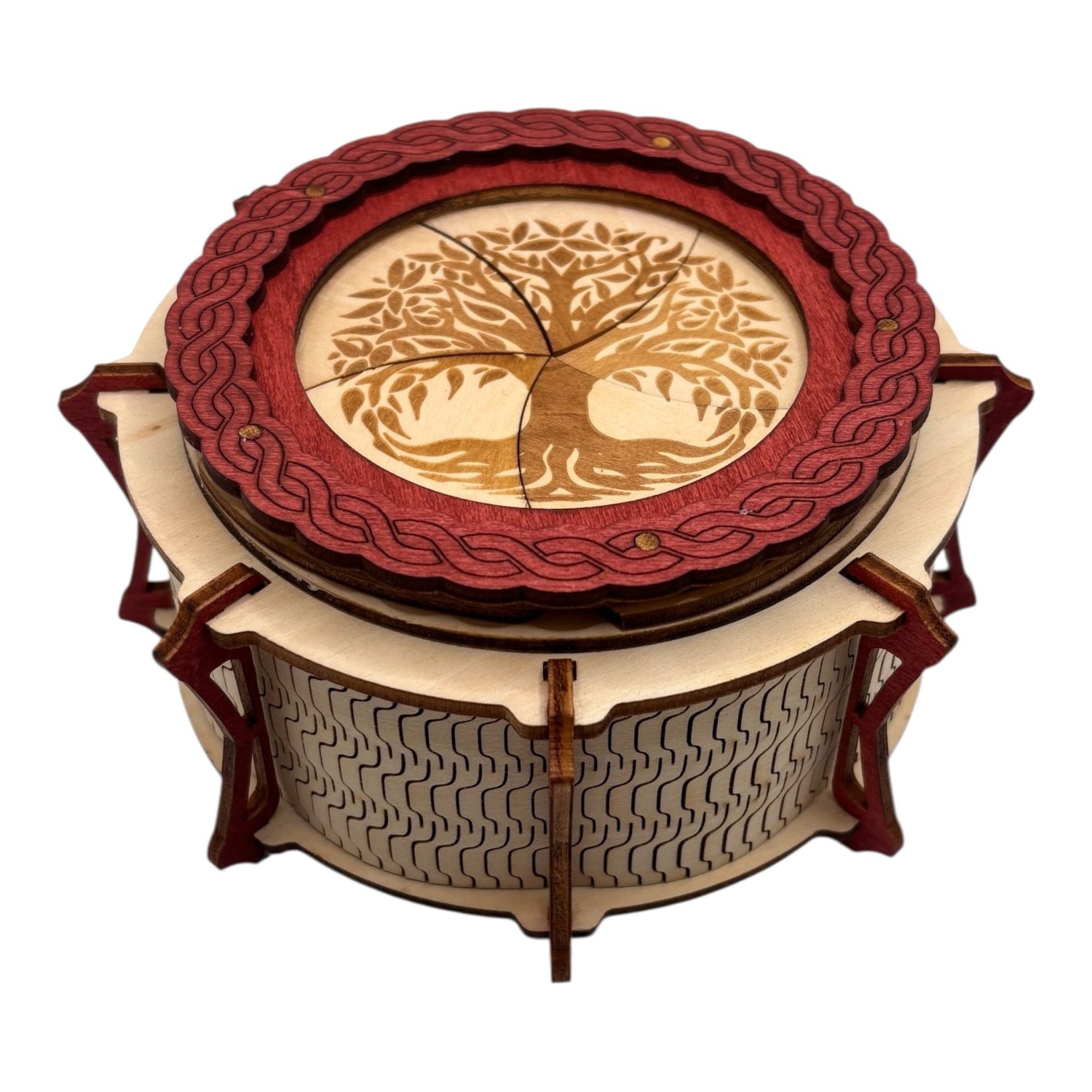 Boîte  ronde à mécanisme en bois, avec système d'ouverture ingénieux pour les esprits curieux. boite à bijoux, boite secrète.
De fabrication française et artisanale 