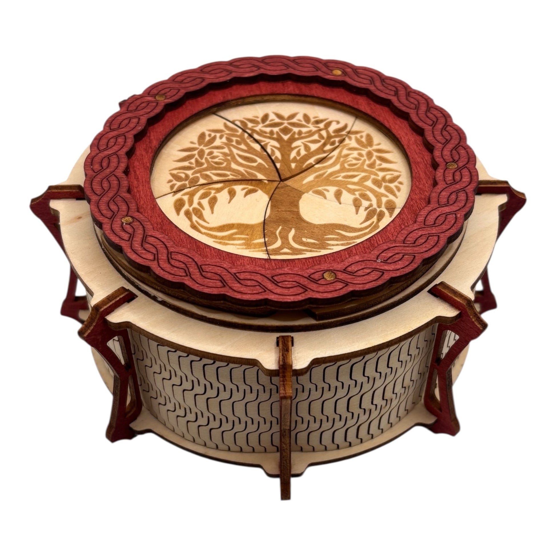 Boîte  ronde à mécanisme en bois, avec système d'ouverture ingénieux pour les esprits curieux. boite à bijoux, boite secrète.
De fabrication française et artisanale 