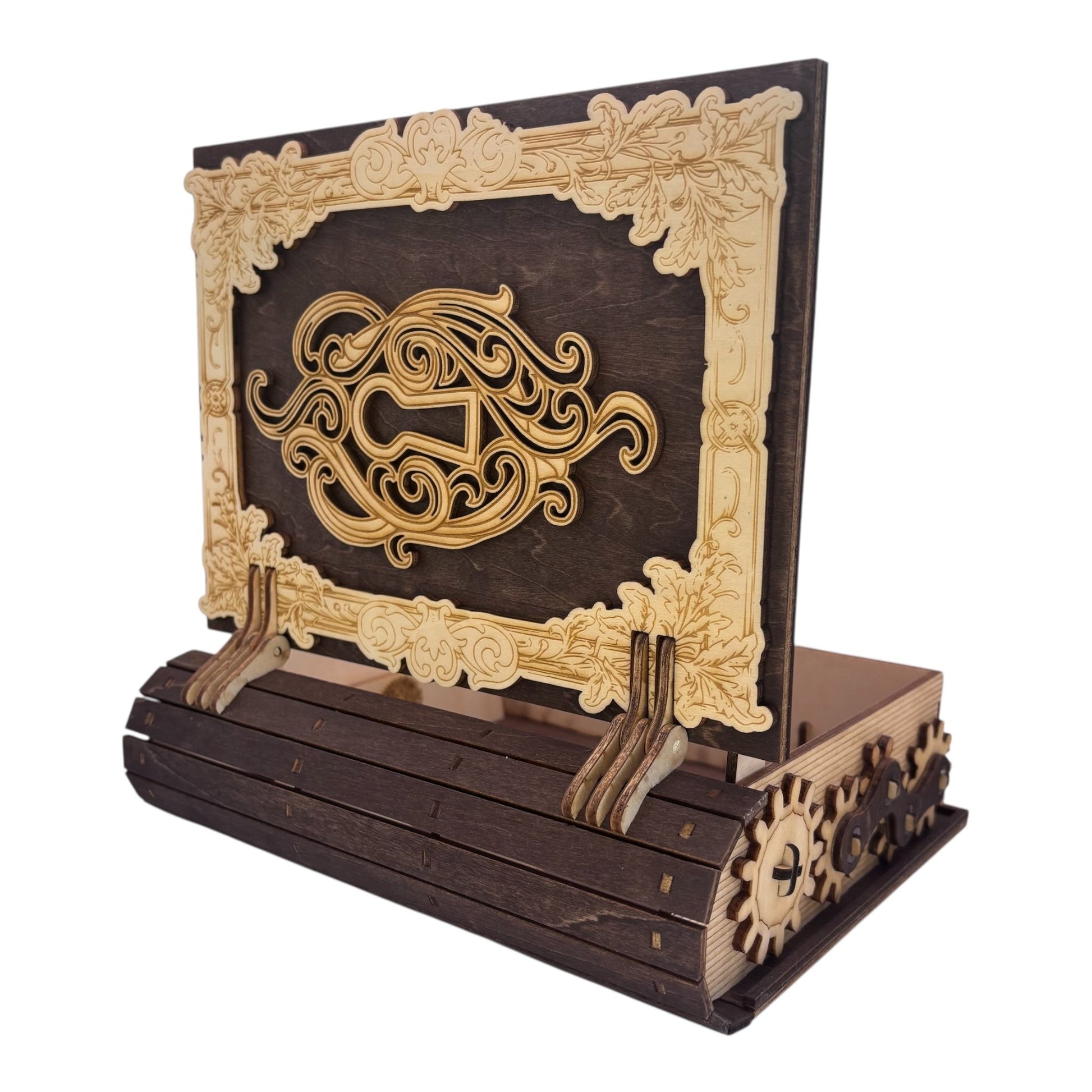 Boite en bois  marron fonce n forme de livre , avec mécanisme d'ouverture par engrenage possibilité boite à musique pour bijou, secrets ou trésors fabrication francaise et artisanale