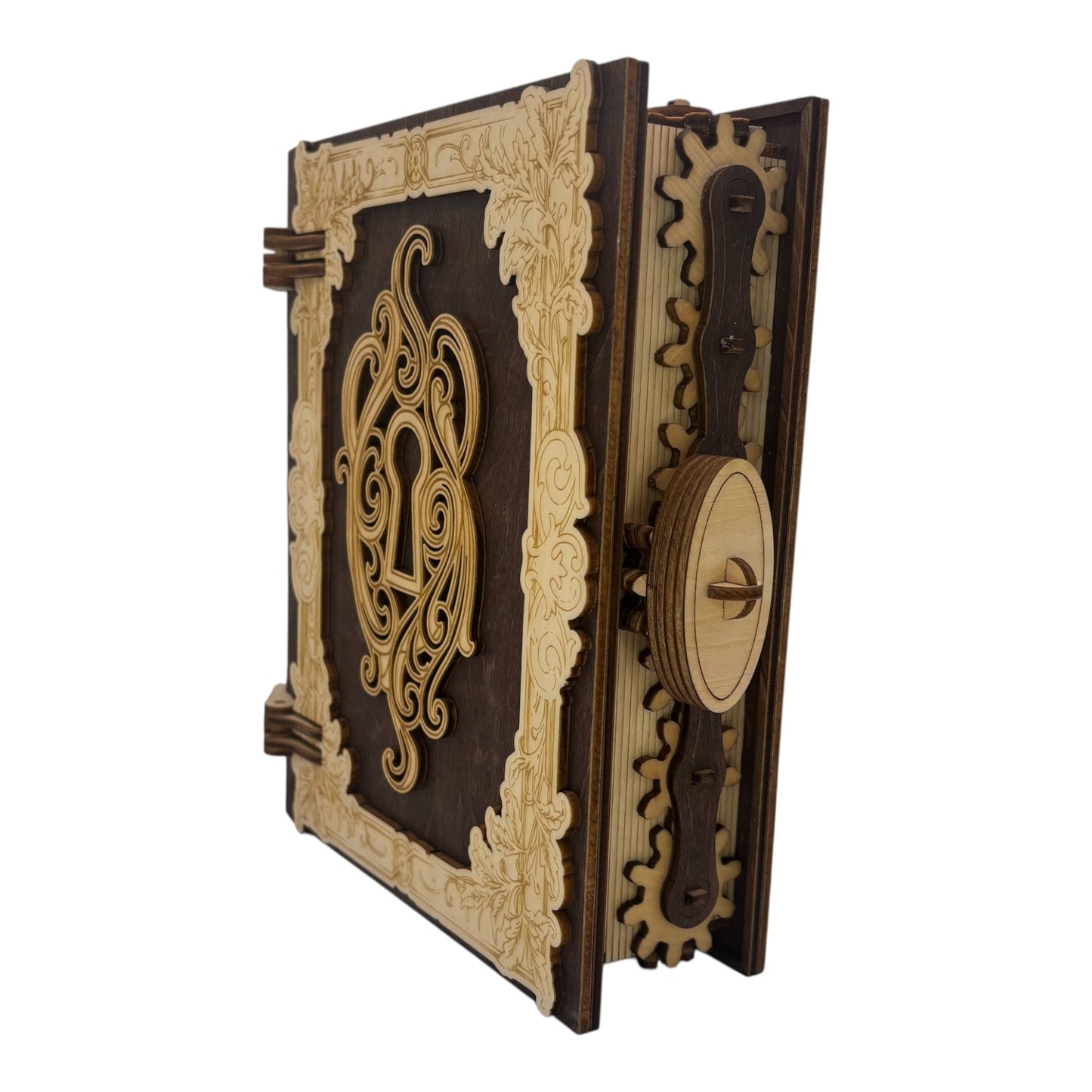 Boite en bois  marron fonce n forme de livre , avec mécanisme d'ouverture par engrenage possibilité boite à musique pour bijou, secrets ou trésors fabrication francaise et artisanale