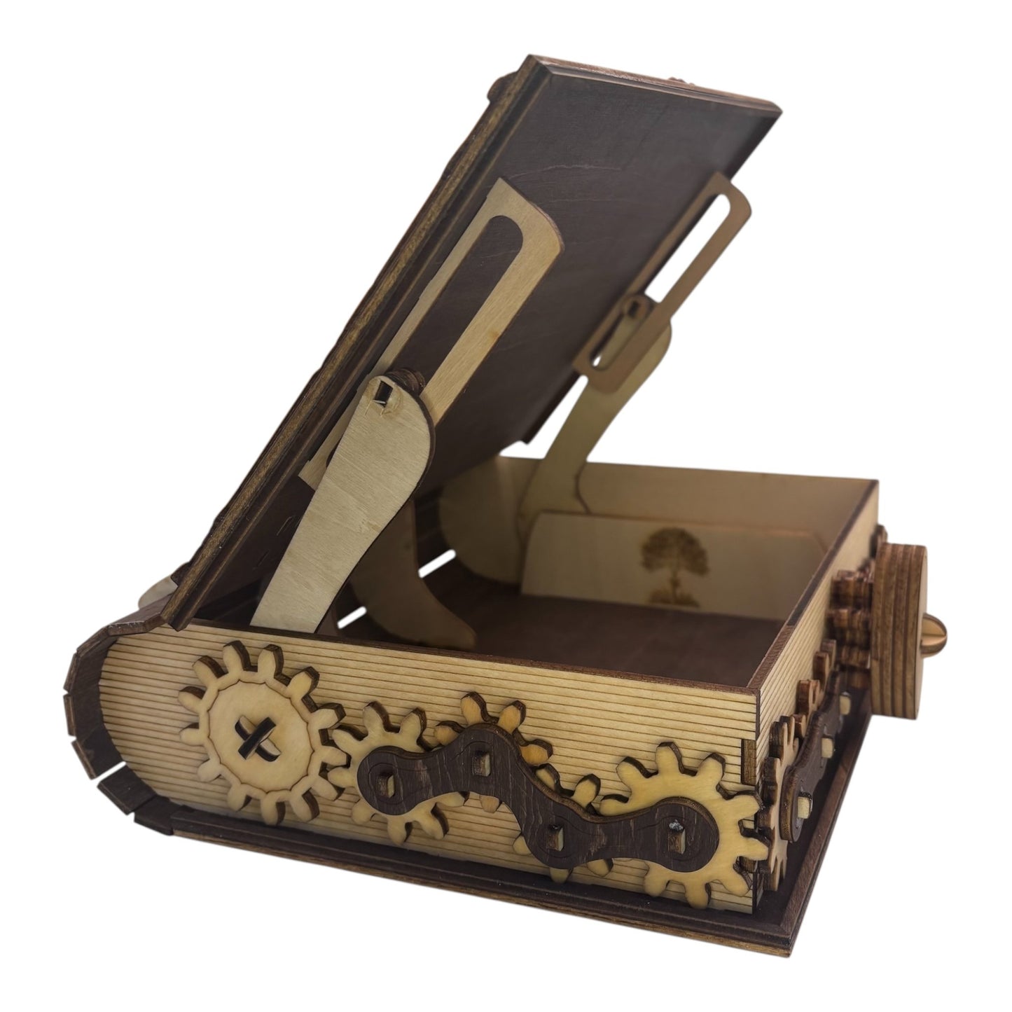 Boite en bois  marron fonce n forme de livre , avec mécanisme d'ouverture par engrenage possibilité boite à musique pour bijou, secrets ou trésors fabrication francaise et artisanale