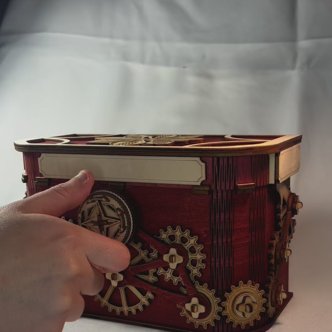 Charger la vidéo : Ouverture coffre à engrenage mécanisme en bois d'une boite à bijoux secret ou trésors , sans casse tete fabrication francaise et artisanale en gravure et decoupe laser pour décoration intérieur